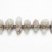 Skyline 2012. Bracelet Ø 9 cm. Silver, aquamarine, cherry wood, cement, paint. Private collection.