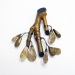 Golden leaves 2014. Brooch height 10 cm. Laurier and pear wood, rutile, silver, paint.