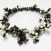 B&W, 2016. Necklace Ø 20 cm. Faceted coloured and white pearls, heather wood, silver.