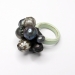 Blacky Mix, 2016. Ring height 40 mm. Faceted pearls, tahiti pearls, wood, paint, composite (ebony powder).