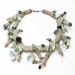 Sauvage, 2016. Necklace Ø 25 cm. Opal, cement, silver.