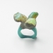 Trio, 2016. Ring height 36 mm. Opal, reconstructed stone, cement.