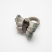 Jungle Moth 2013. Ring 48 x 38 x 43mm. Moldavite, aquamarine, wood, cement.
