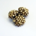 Jungle Honey 2014. Brooch 9 x 10 x 4 cm. Pearls, composite, silver.