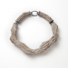 Antoinette 2013. Necklace Ø 19 cm. Pearls, cement, wood, silver.