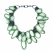 Mossy green 2007. Necklace Ø 19 cm. Porcelain, textile, silver, steel. Private collection.